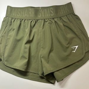 GYMSHARK training loose fit shorts | size XS dark green
